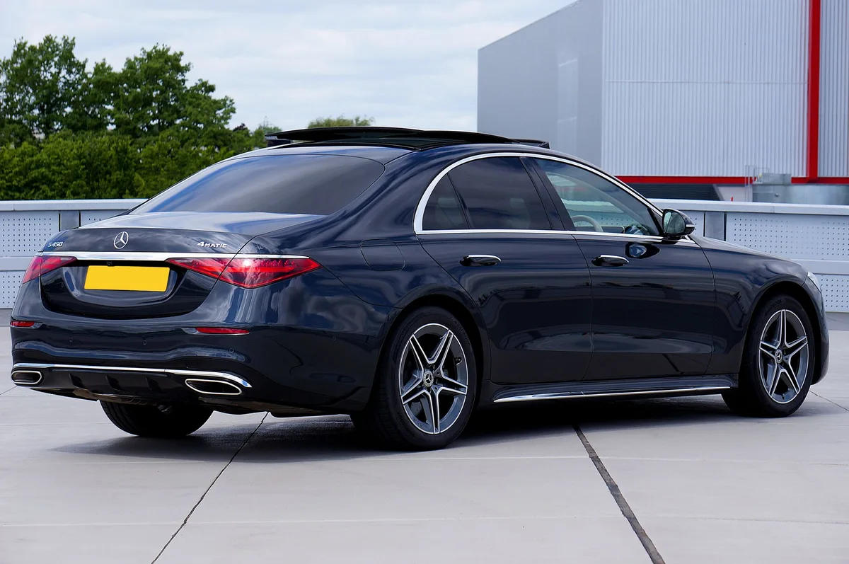 Malaga airport taxi Mercedes S-Class modern urban luxury setting