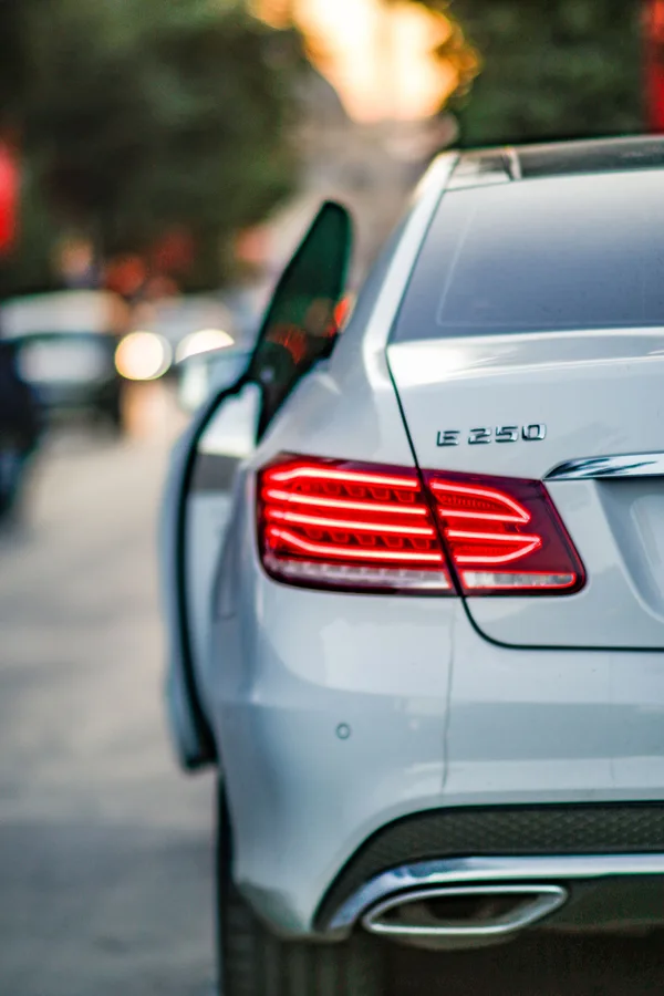 Malaga airport transfer Mercedes E-Class door open twilight VIP service
