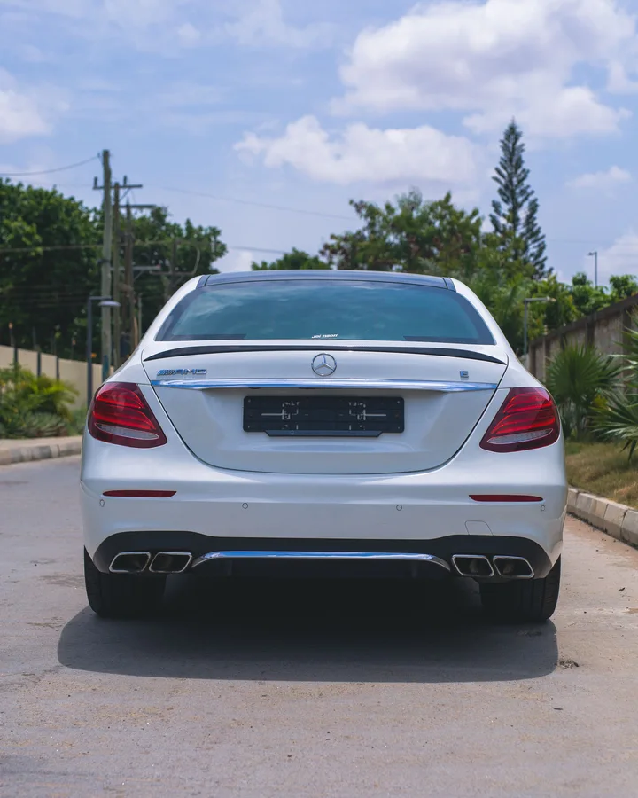 Malaga private taxi Mercedes E-Class rear view outdoor airport transfer